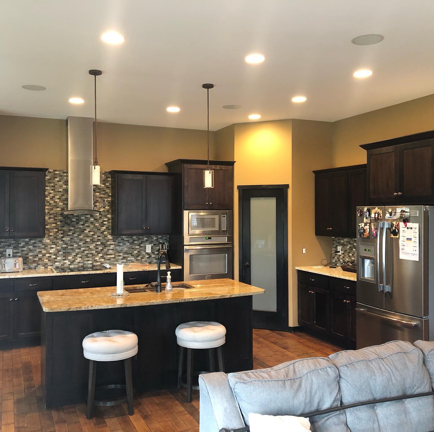 painting contractor Fargo ND working on residential home